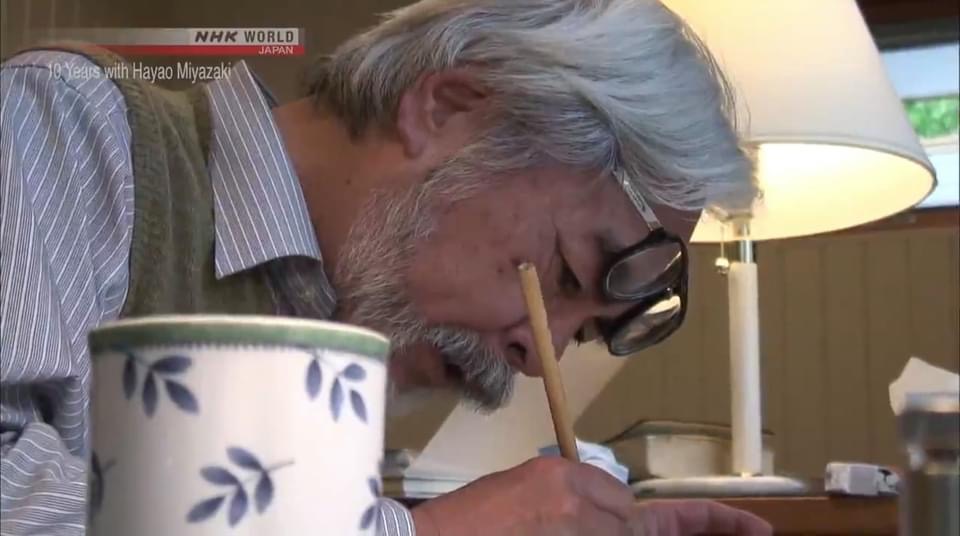 Miyazaki Drawing Behind the Blue-Leaf Mug